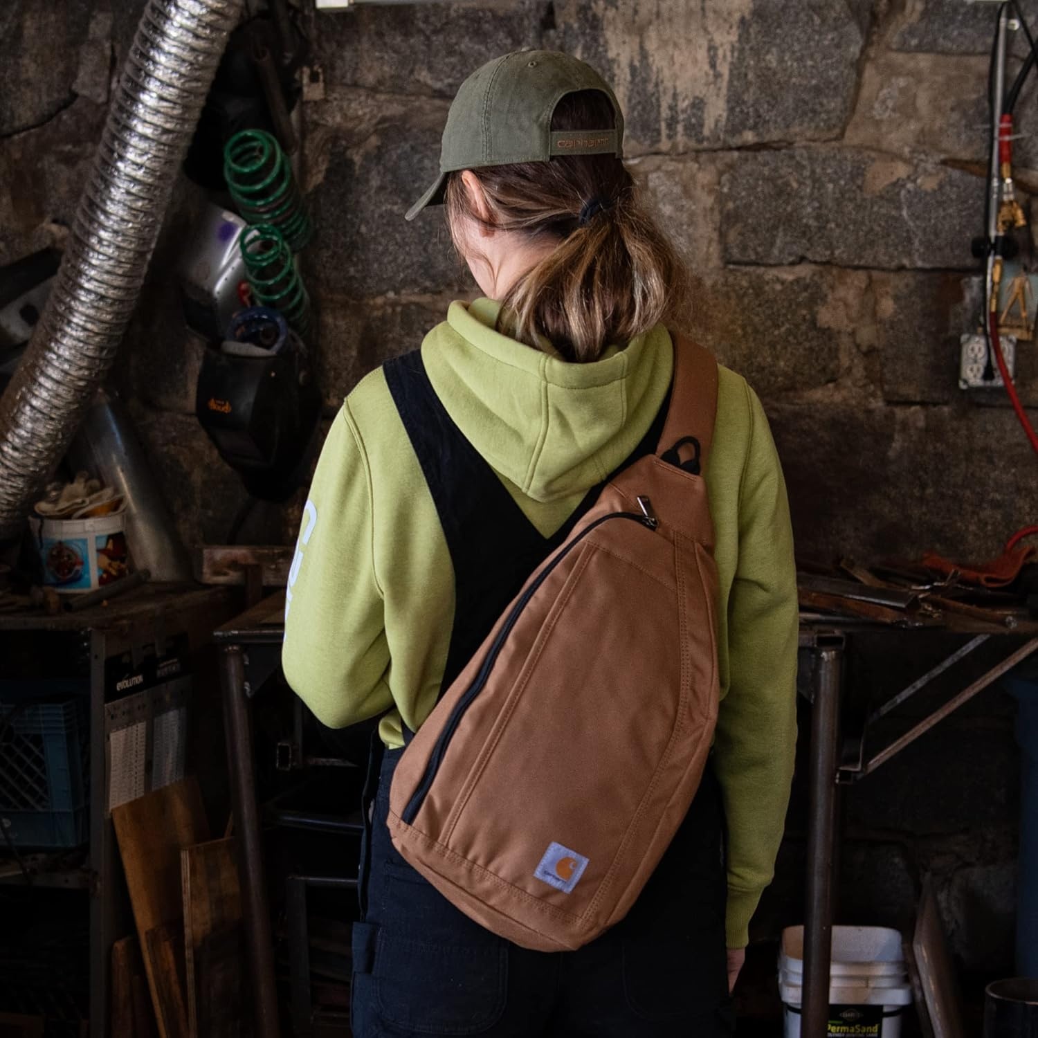 image:imageCarhartt Durable Sling Bag Crossbody Backpack with Side Release Buckle Tablet Sleeve and Adjustable Strap BlackCrossbody Backpack Carhartt Brown